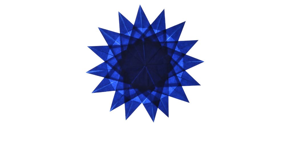 16 point star made of blue kite paper