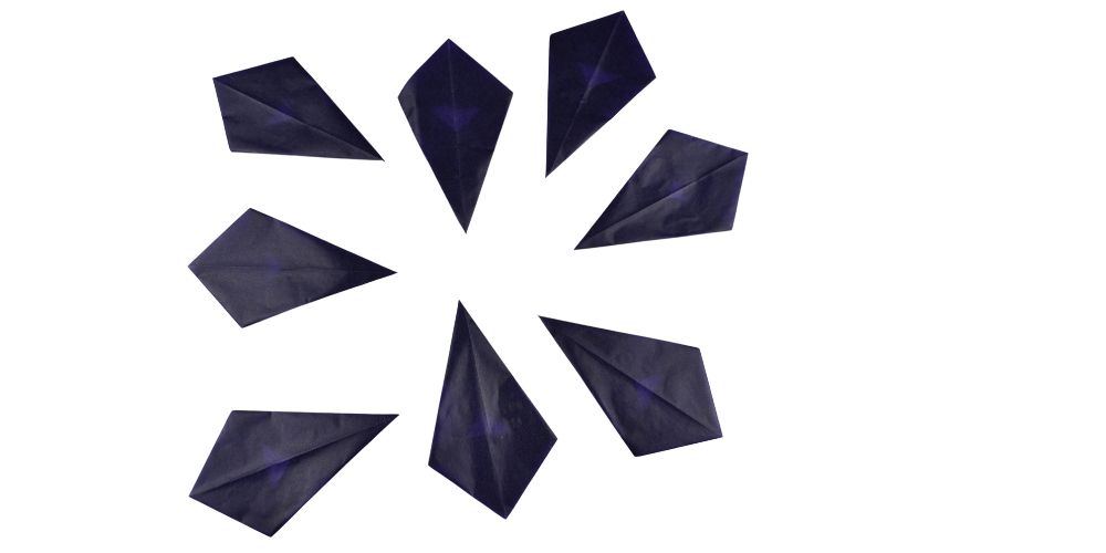 8  star points made of kite paper