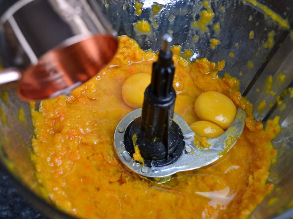 mashh mandarines and eggs on a food processor 