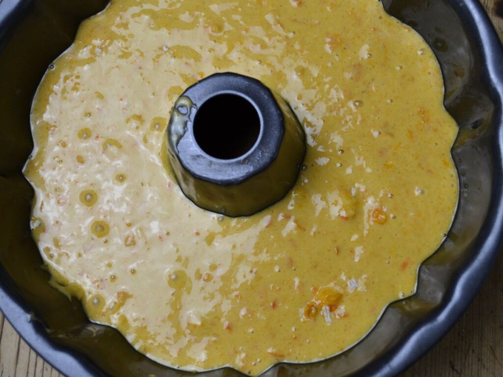 mandarin orange batter on a cake pan 