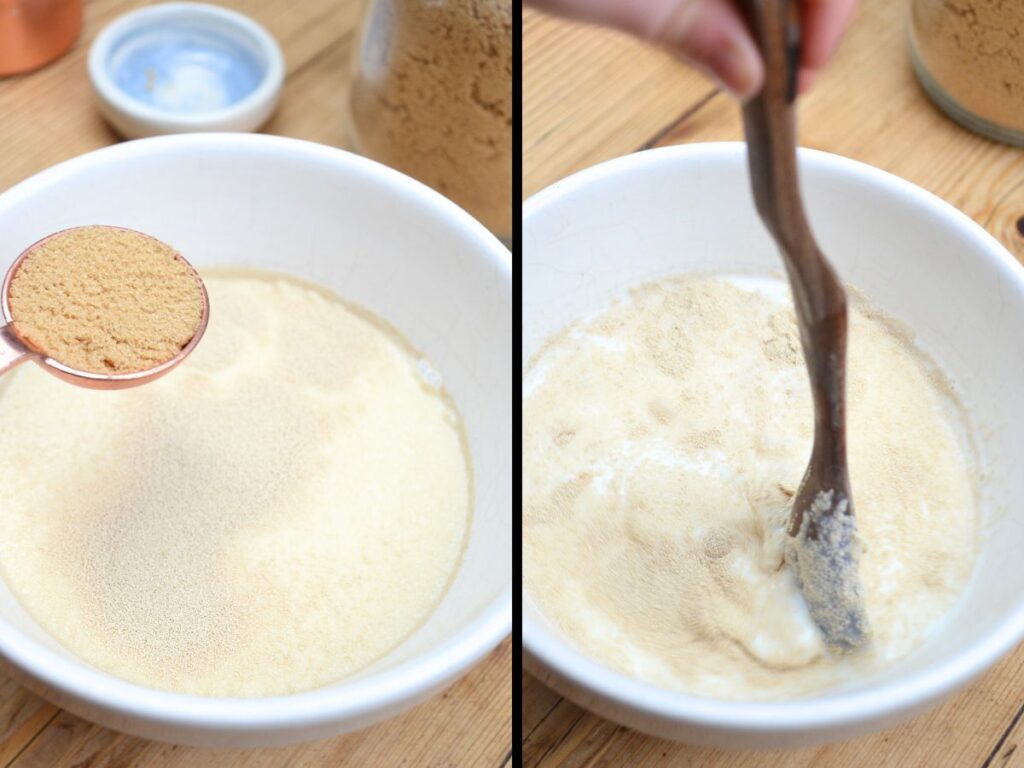 a bowl with milk, yeast and sugar, a spoonful of sugar, and a wooden spoon mixing the yeast and milk.