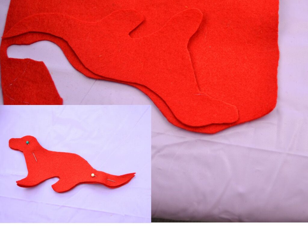 two pieces of felt with a shape of dragon