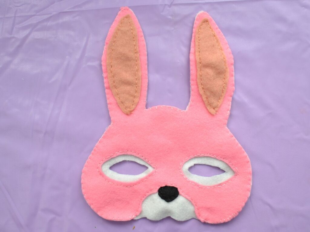 A felt bunny mask with all the sewing done.