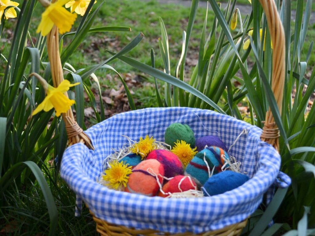 Felted easter eggs on a basket.