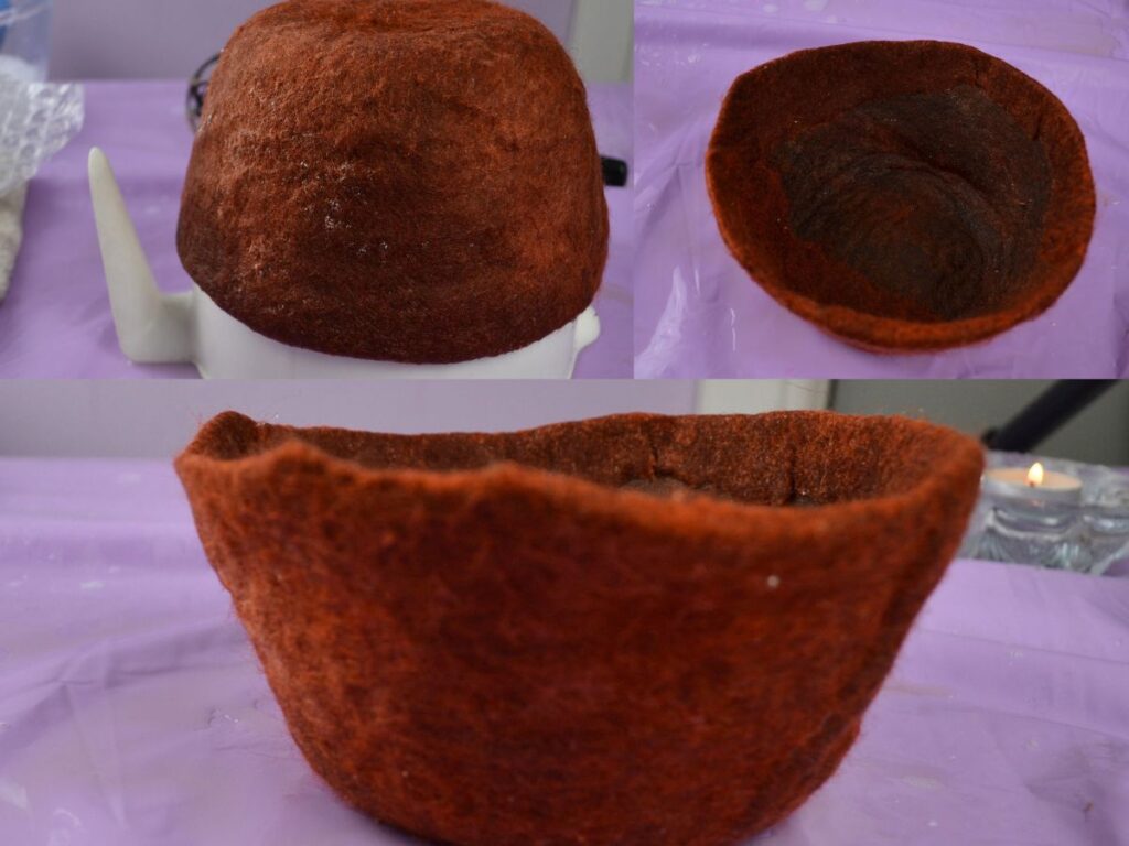 An almost finished wet felting basket.
