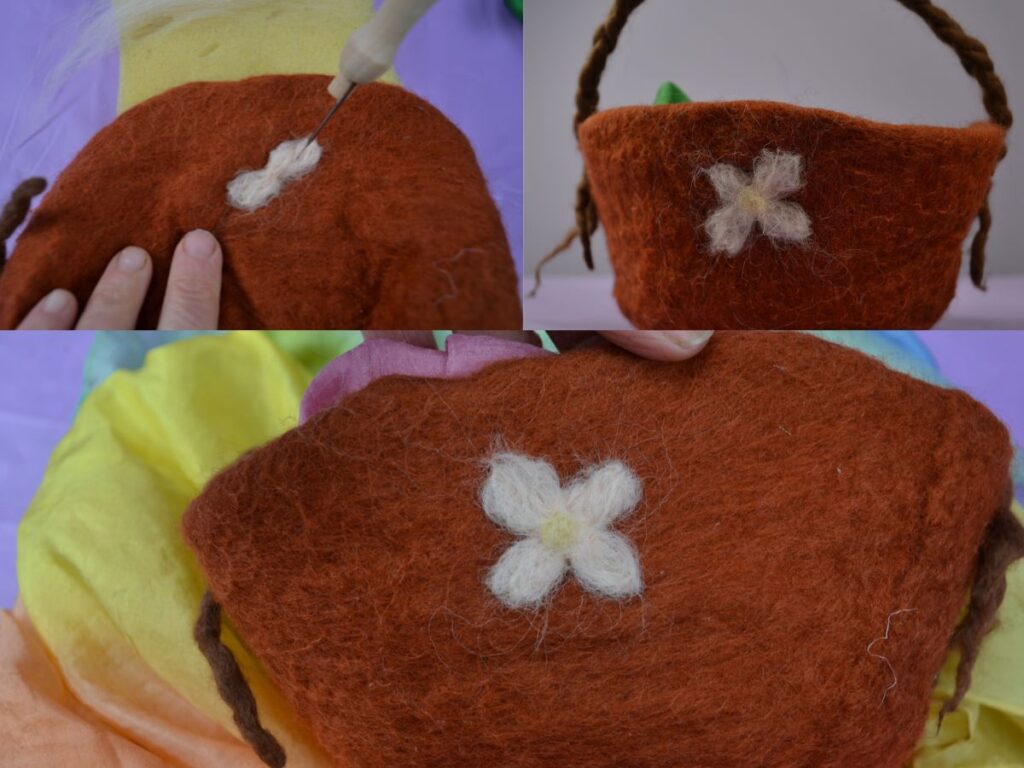 Needle felting a flower onto a wet-felted basket.