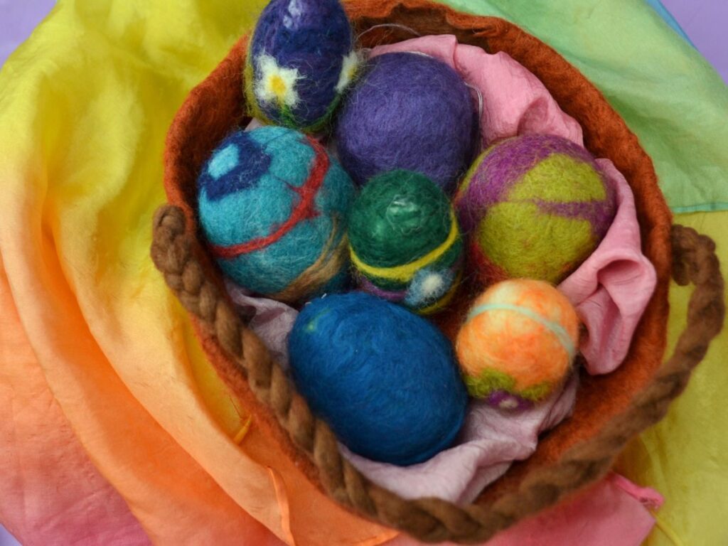 A wet-felted basket with easter eggs.