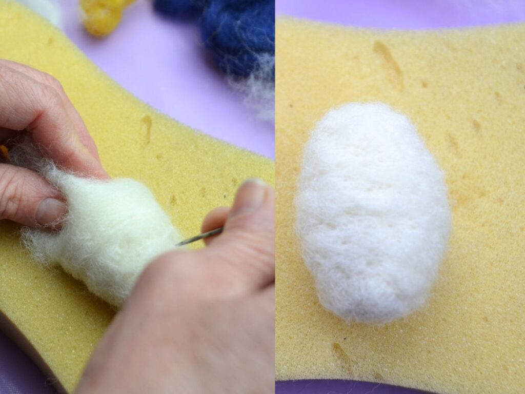 Hands needle felting an easter egg.