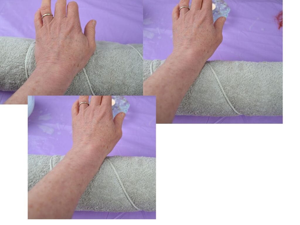 Hands using a pool noodle to felt.