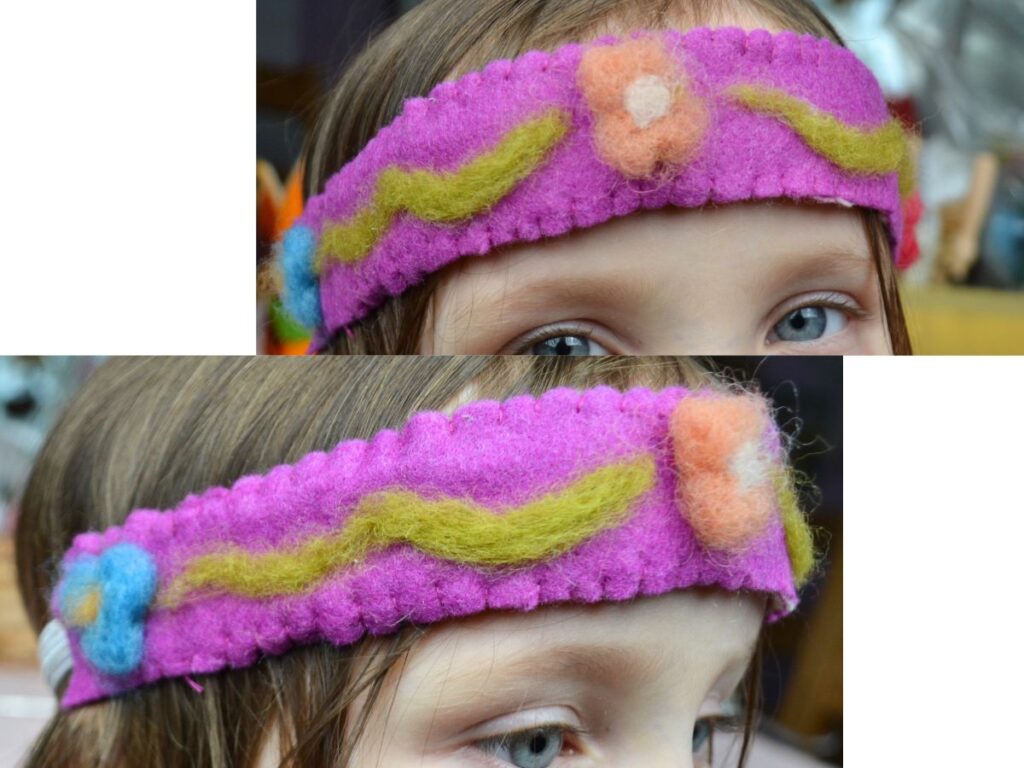 A girl wearing a handmade felt crown.