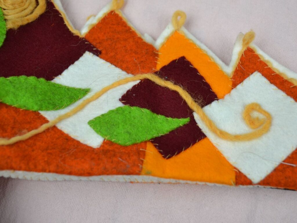 One side of a felt crown.