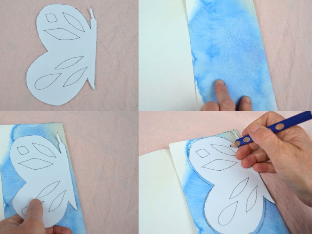 Marking a buterfly template to a colour paper.