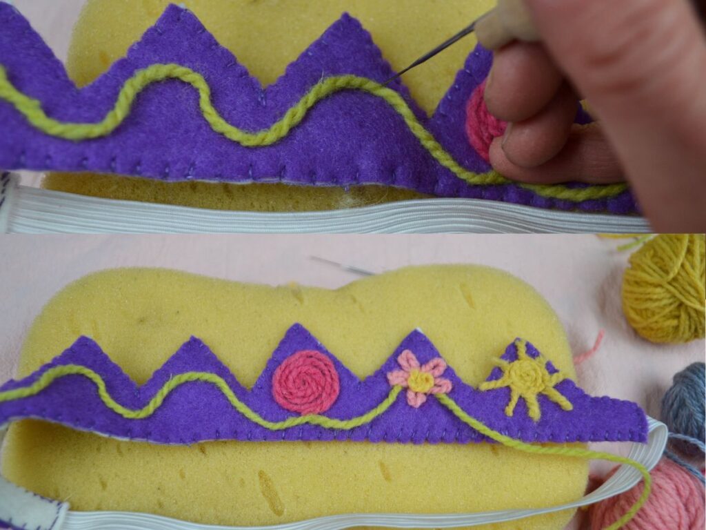 Decorating a felt crown with Needle felting and wool.