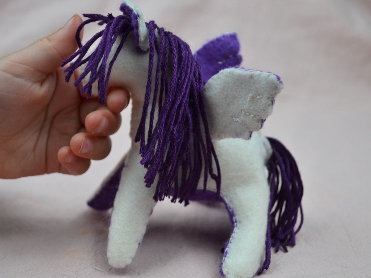 A Handmade felt pegasus.