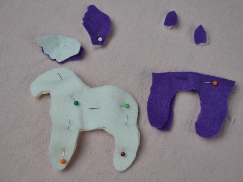 Felt pegasus pieces pin together.