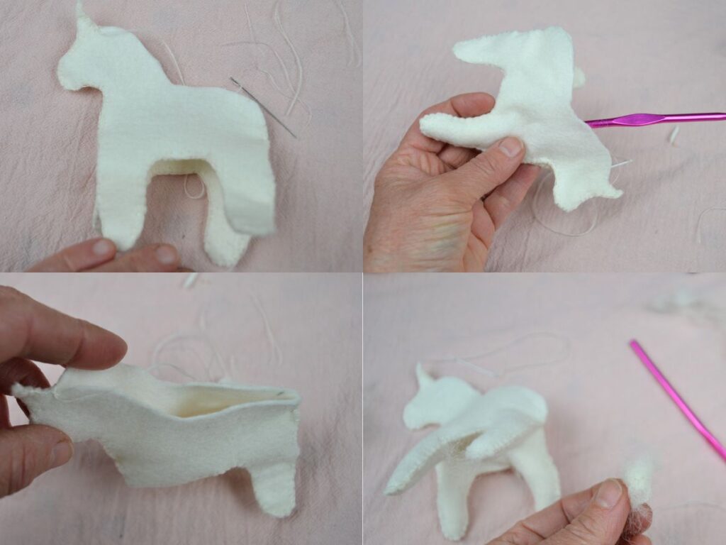 A Felt Unicorn being stuf with wool using a crochet needle.