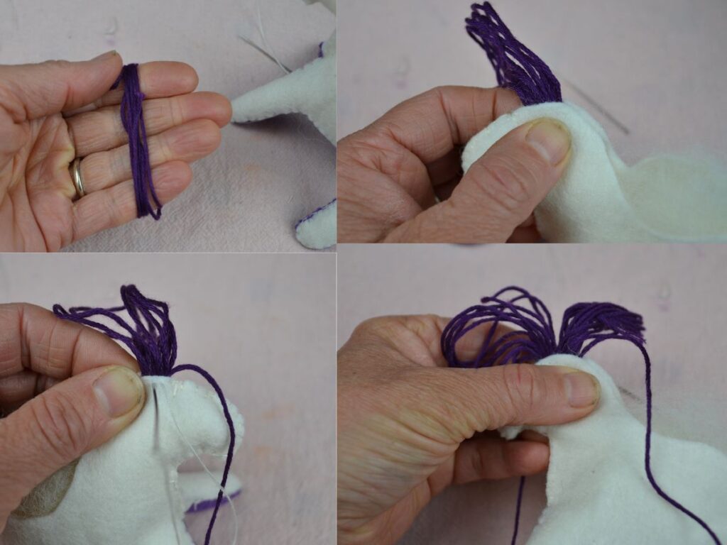 Inserting embroidered hread to make the mane of a felt pegasus.