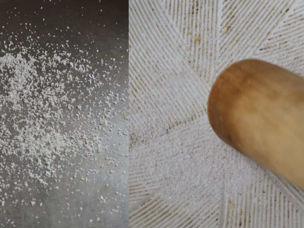Sea salt is being toasted in a pan, and salt is in the suribachi.