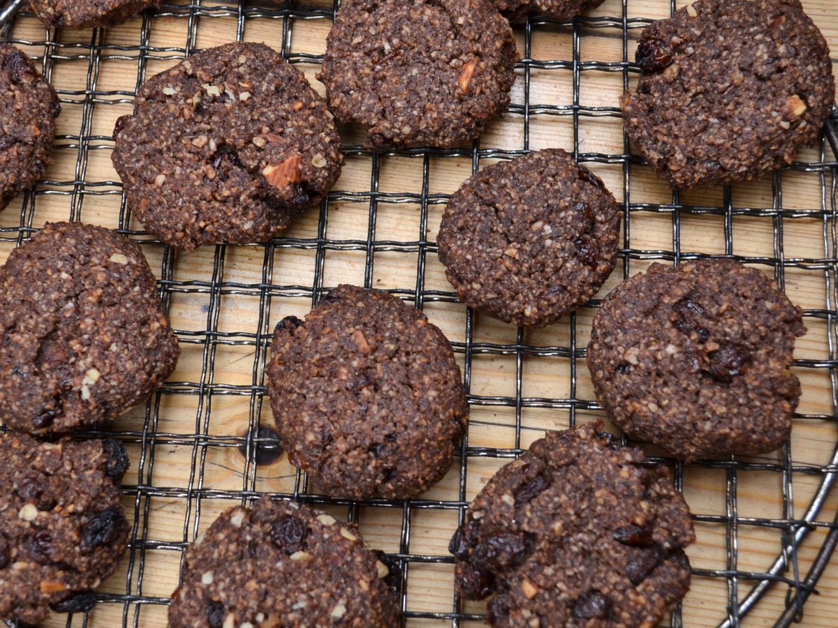 Millet chocolate cookies on a cooling rack.