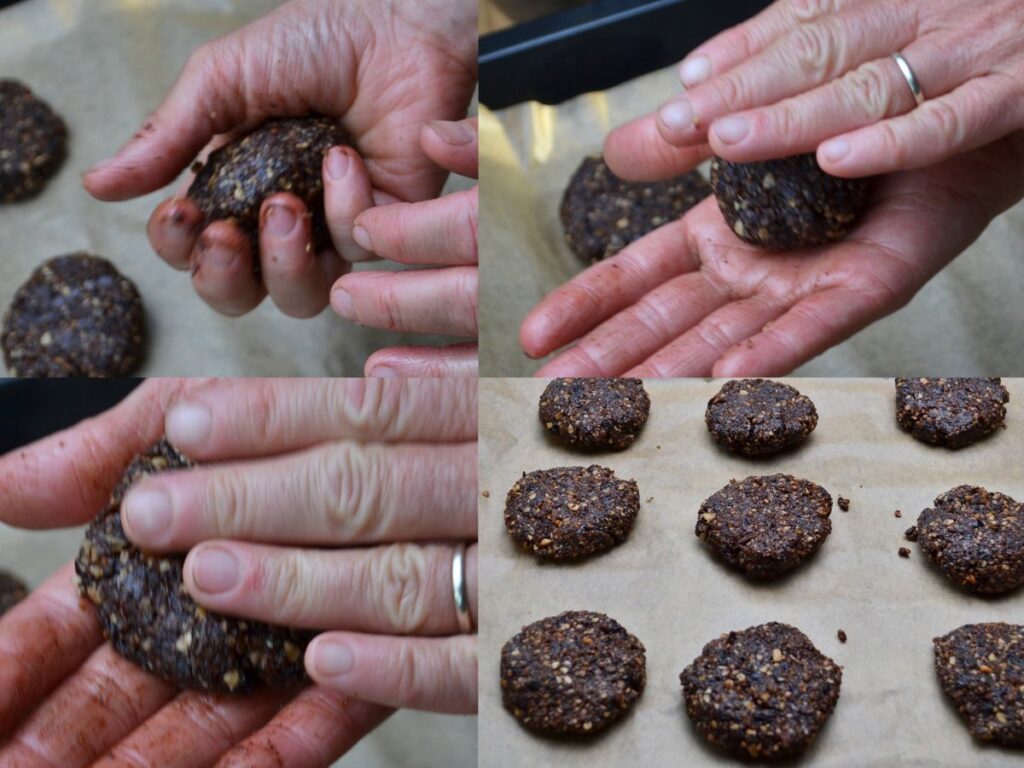 Forming millet chocolate cookies with hands.