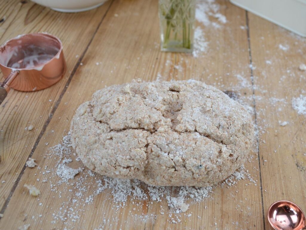 Rice Bread dough on a wooden table.