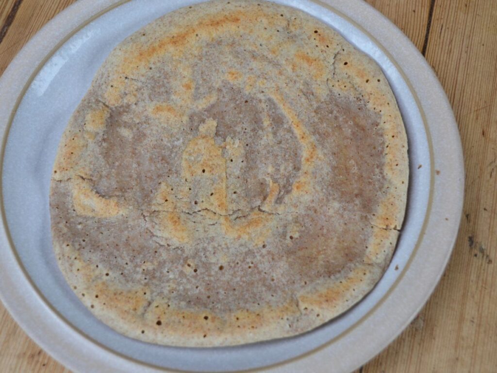 A buckwheat crêpe on a plate.